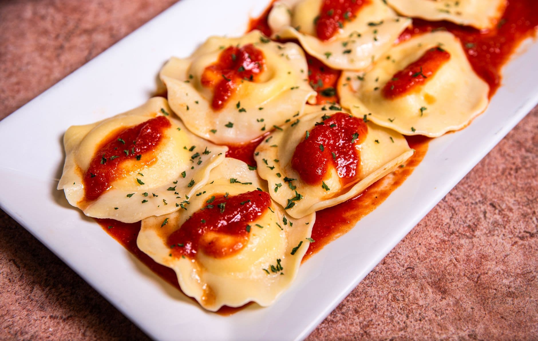 Ravioles con Salsa BRASA Rotisería